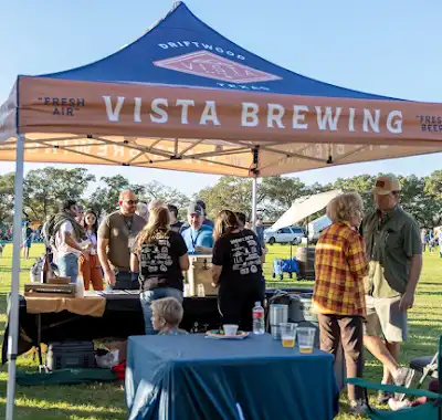 Visitors at the Vista Brewing tent